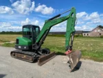 Mini-Pelle BOBCAT E55 d’Occasion – 5,7T (2012) Révisée avec 3 Godets