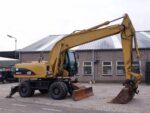 Pelle sur pneus Caterpillar M318C 2005 – 19,7T – Occasion – Image 2