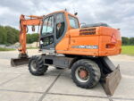 Pelle sur pneus Doosan DX140W 2010 – 14,8T – 7857h – Occasion – Image 2